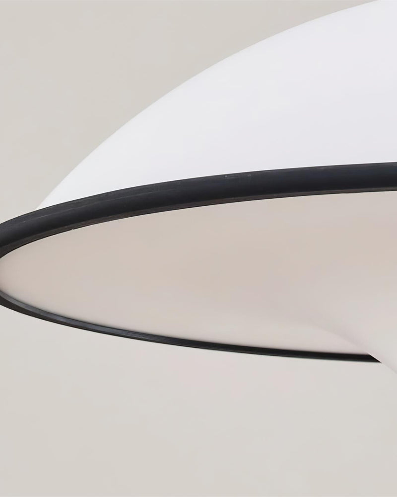 Close-up of the AOSTA No.01 acrylic pendant light, white saucer edge with a matte black rim