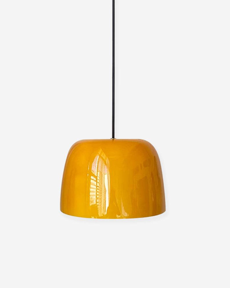 Amber glass pendant light MIELE No.01, glossy amber dome on a black cord against a white background