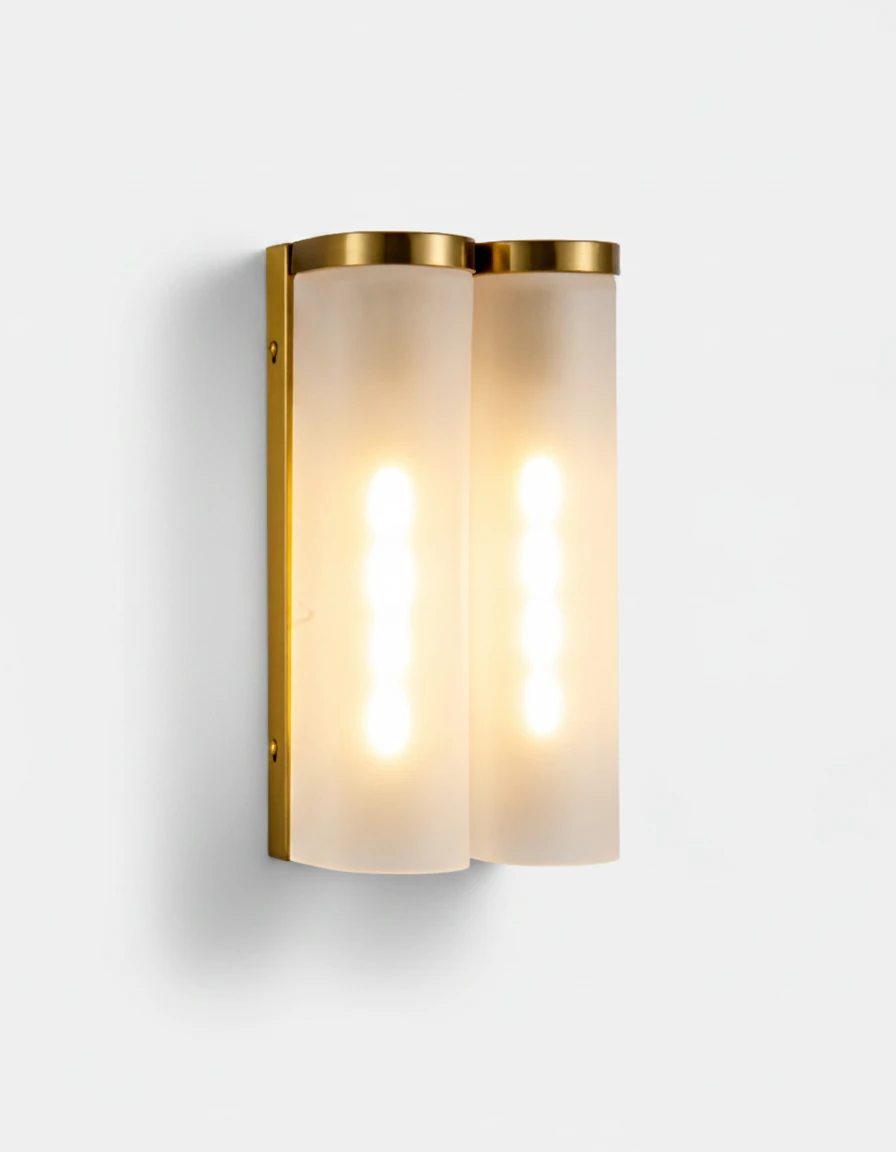 Brass wall sconce PILA No.01 Twin Shields, paired frosted glass columns with antique brass caps, switched on