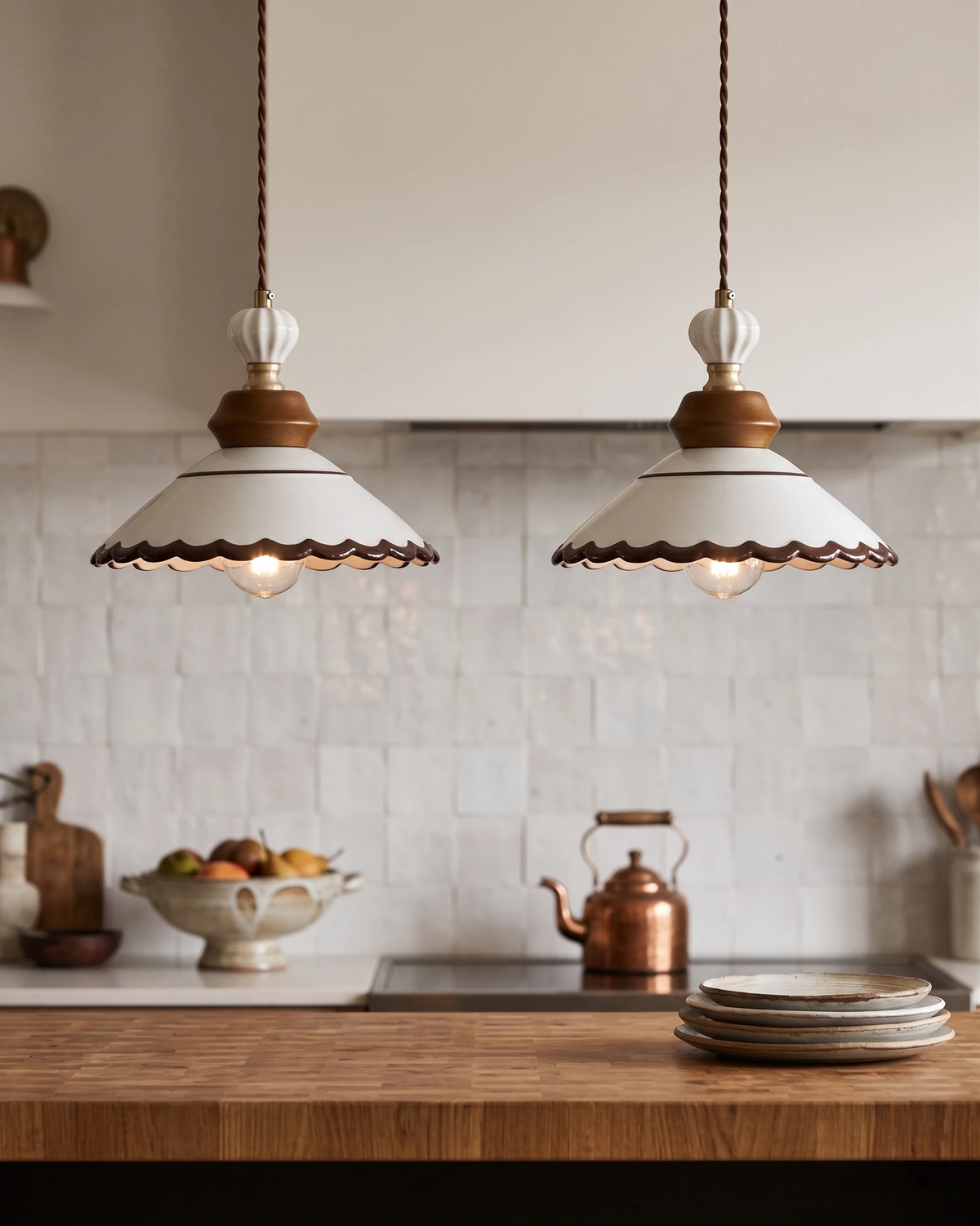 Ceramic pendant light MELI No.02, two pendants lit above a butcher block kitchen counter with a copper kettle