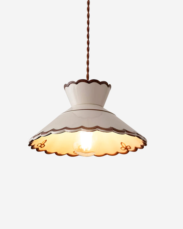 Ceramic pendant light MELI No.04, cream white scalloped shade with brown trim, bulb switched on