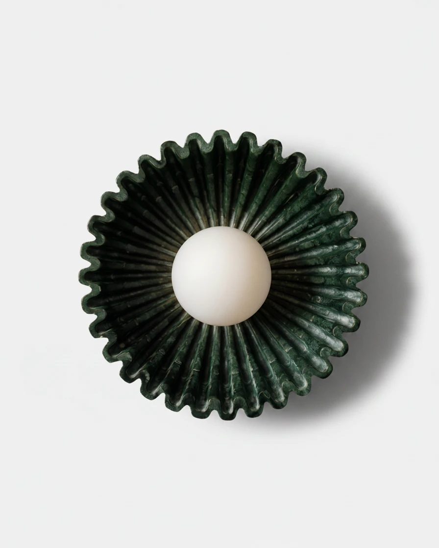 Ceramic wall sconce RAGGI No.01 in Forest Green, scalloped sunburst ring around a white opal globe, unlit