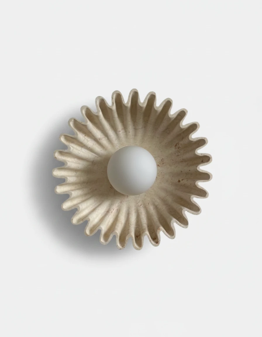 Ceramic wall sconce RAGGI No.01 in Sand Beige, cream fluted sunburst with a frosted glass globe, unlit packshot