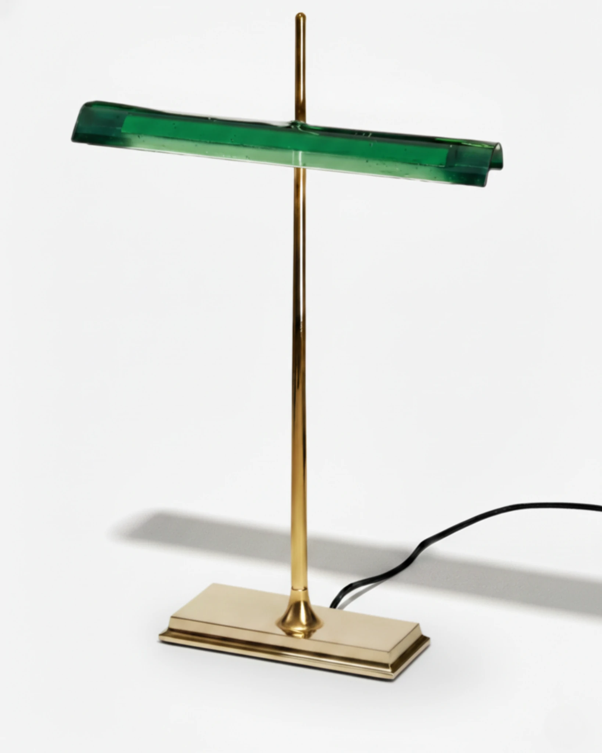 Cordless desk lamp BANCO No.02 in Forest Green, translucent green shade on a brass stem and stepped base