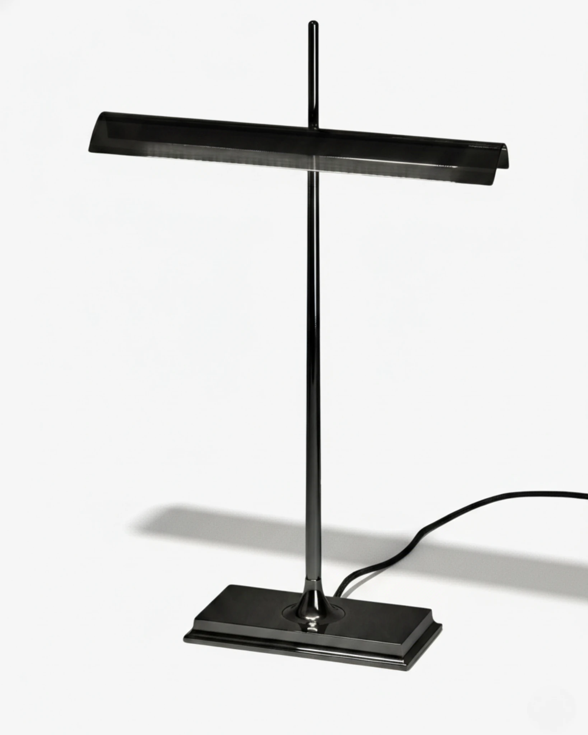 Cordless desk lamp BANCO No.02 in Volcano Black, slim black stem and shade on a rectangular black base