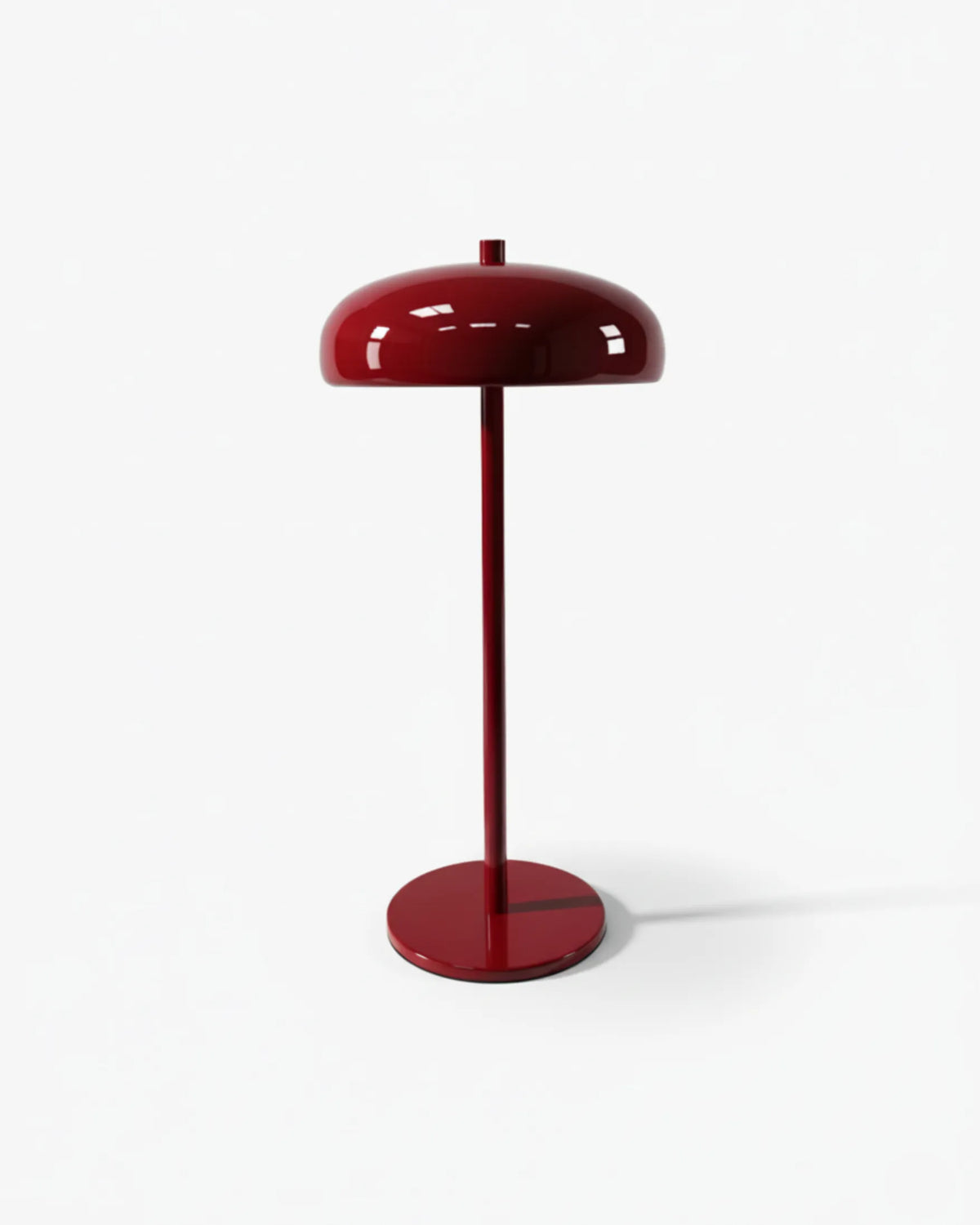 Cordless mushroom lamp DOMA No.01 in Burgundy Red, glossy dome shade on a slim stem and round base, unlit
