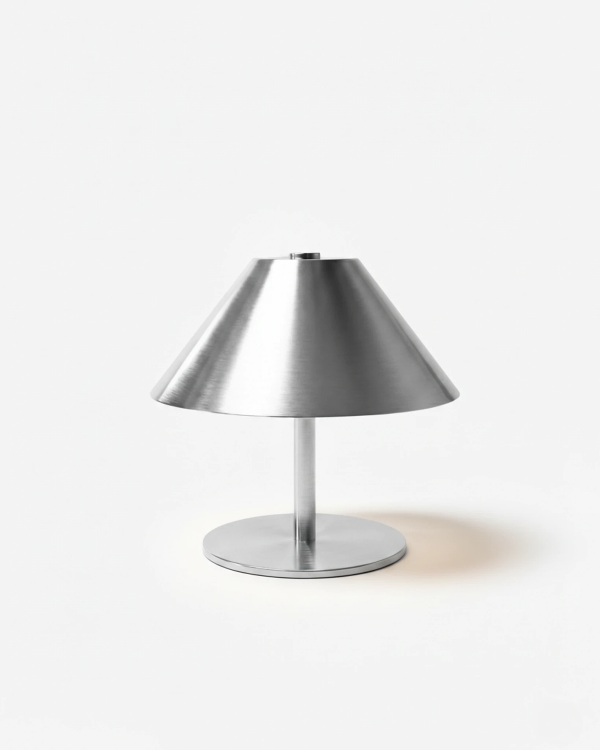 Cordless table lamp LUMA No.03 in brushed silver, classic cone shade on a slim stem and round base, unlit
