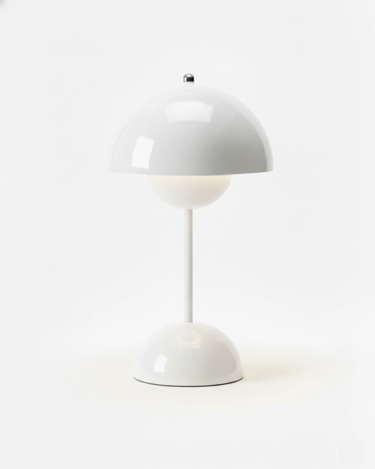 Cordless table lamp DOMA No.02 in Ivory White, glossy white dome on a slim stem, unlit studio shot