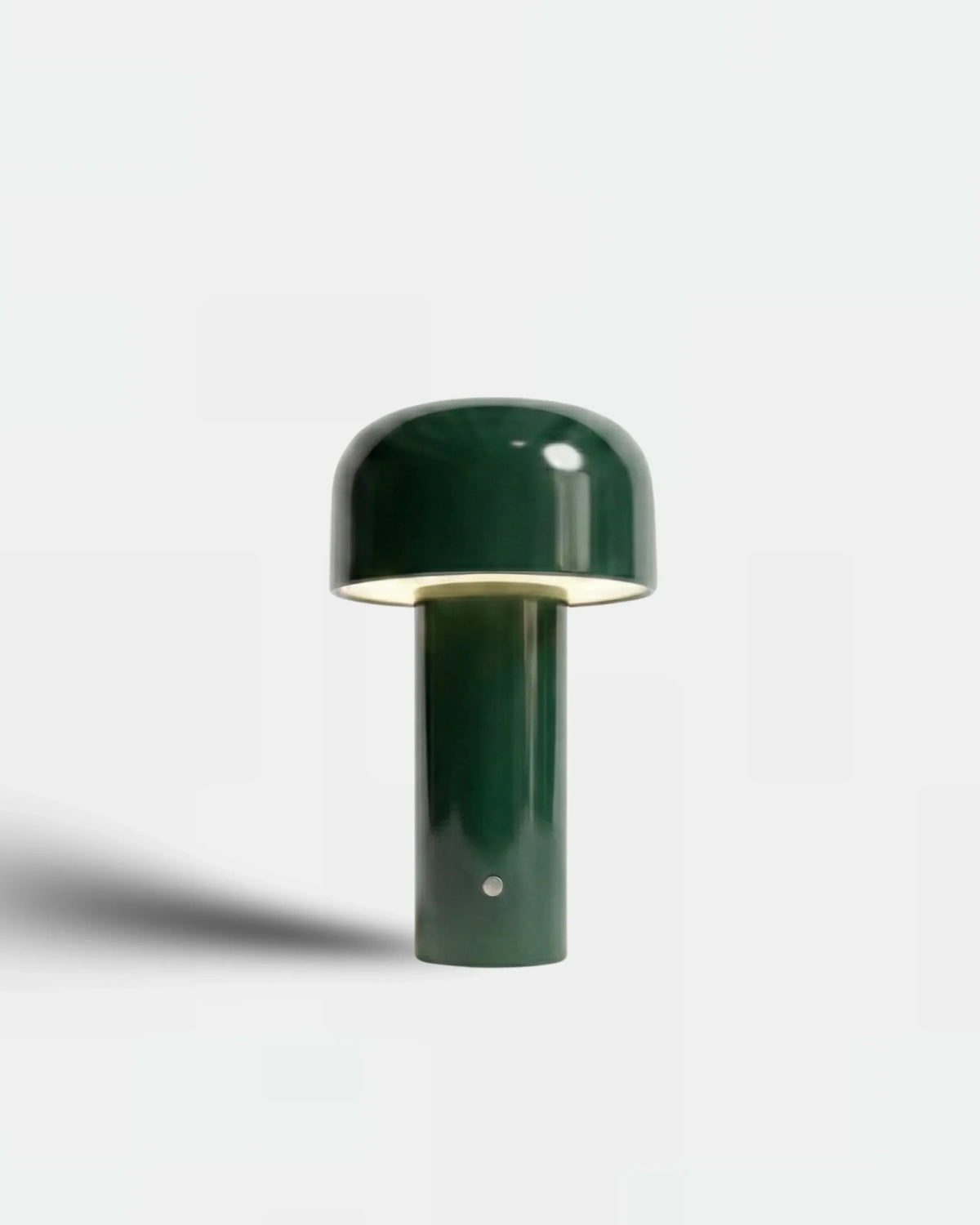 Cordless table lamp DOLCE No.01 in forest green, glossy bud head lit above a slim cylindrical base