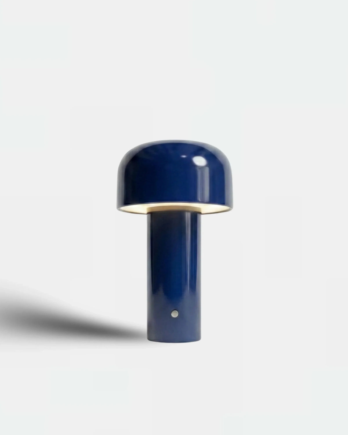 Cordless table lamp DOLCE No.01 in royal blue, compact flower-bud silhouette with a glowing shade
