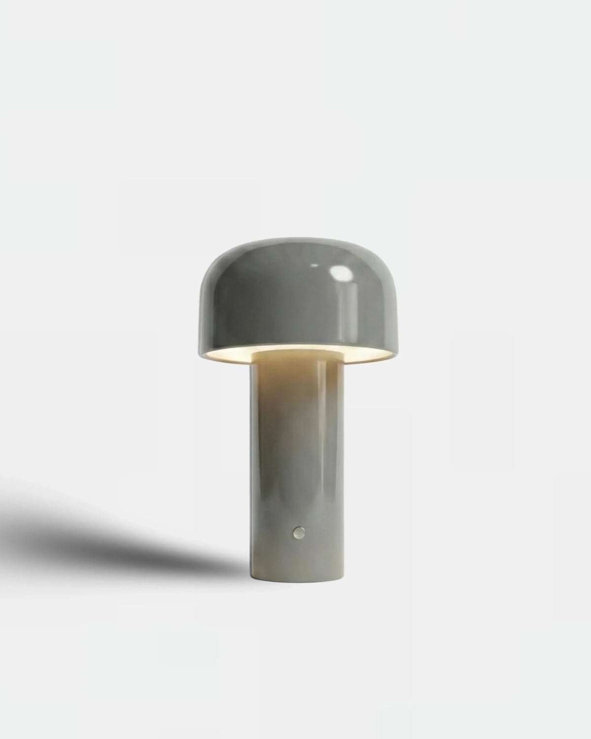 Cordless table lamp DOLCE No.01 in soft grey, mini mushroom-bud form switched on, studio packshot