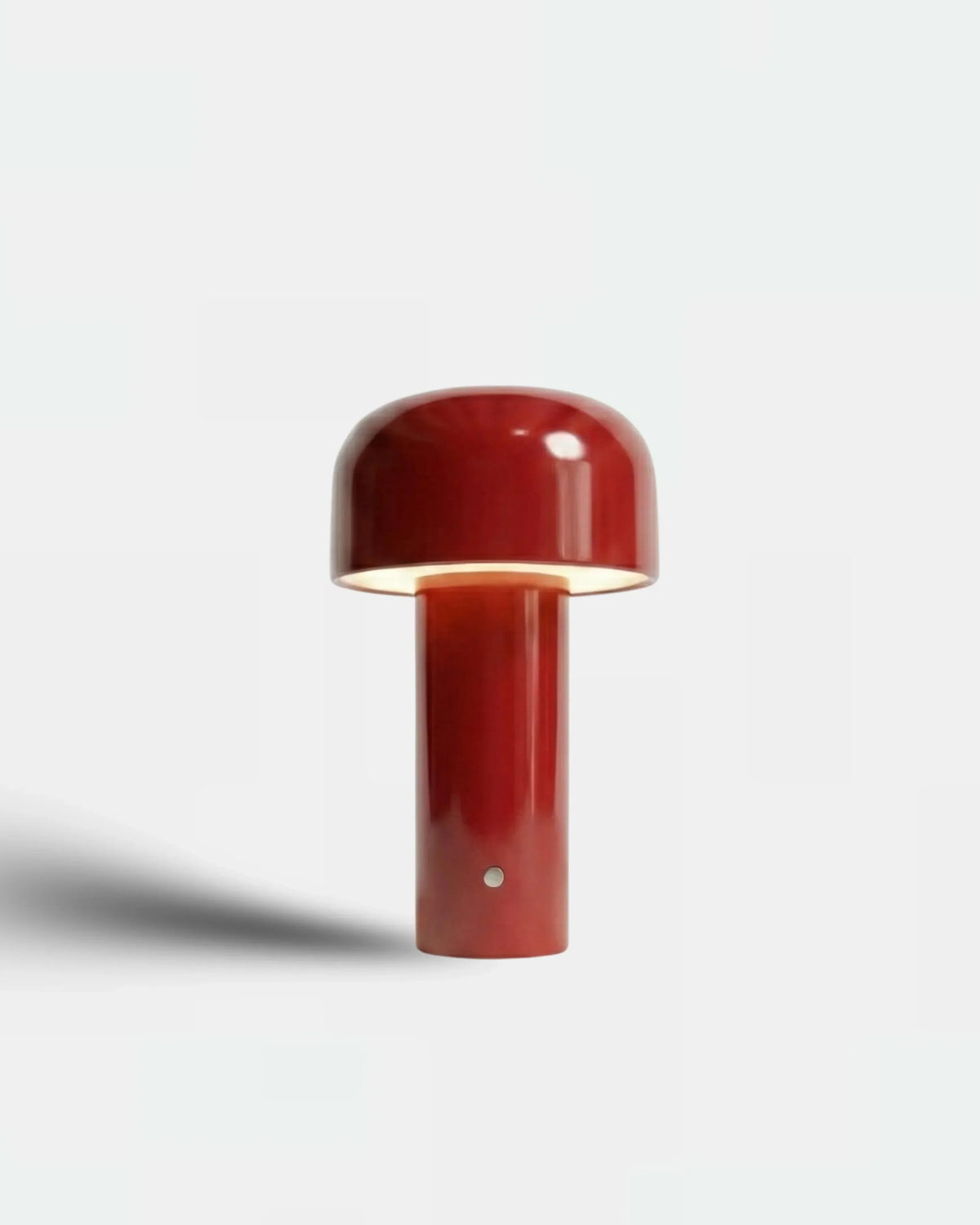 Cordless table lamp DOLCE No.01 in vermilion red, glossy bud-shaped head lit on a white background