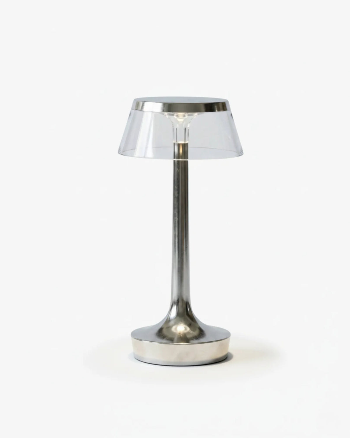 Cordless table lamp ZARA No.01 in polished chrome, slim stem with a clear crown diffuser on a white background