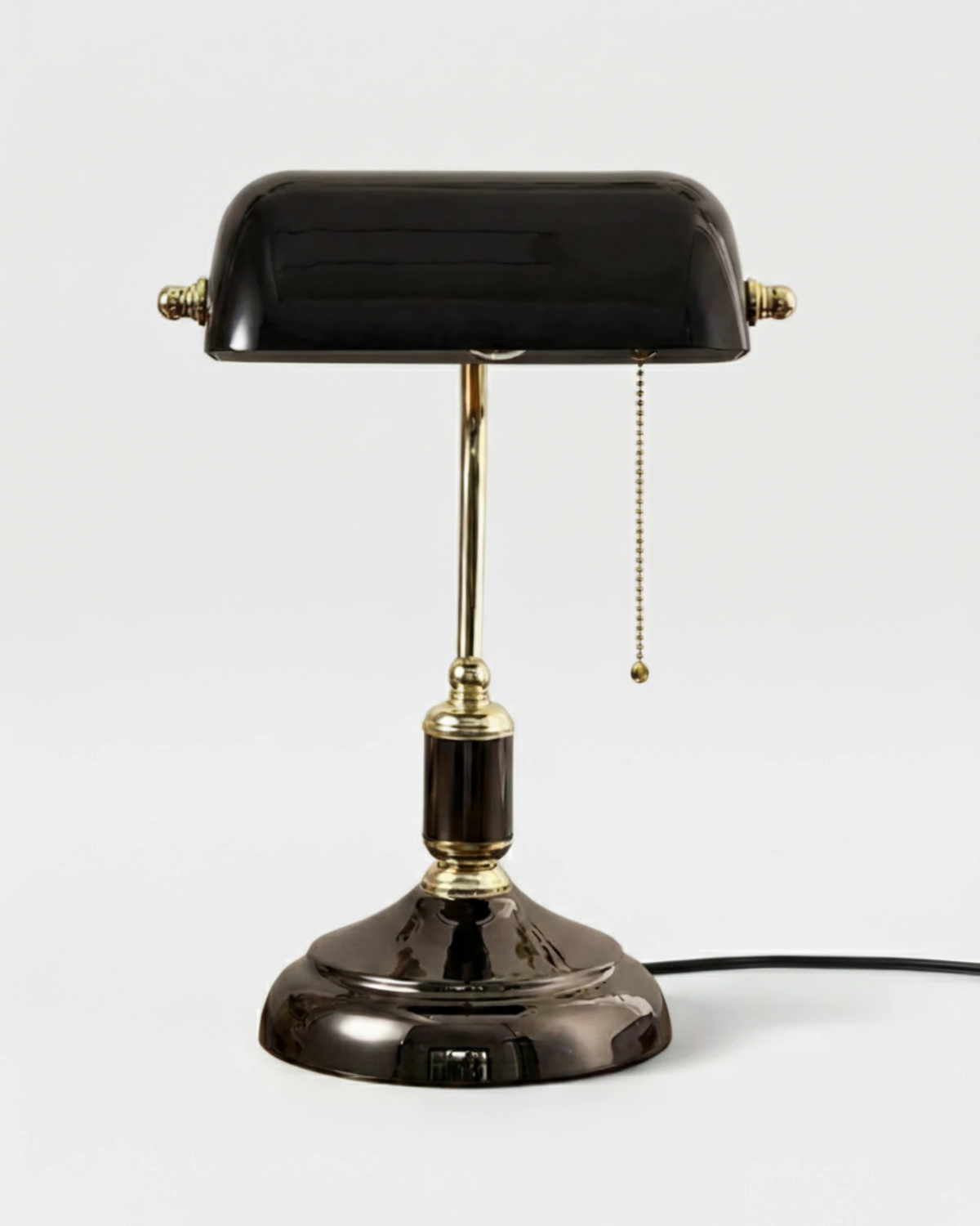 Glass desk lamp BANCO No.01 in Volcano Black, black glass shade on a dark gunmetal base with brass pull chain