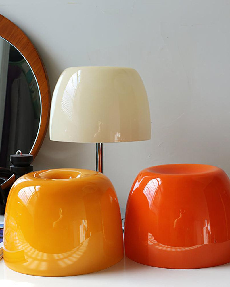 Close-up of the VENEZIA No.01 glass table lamp shade colors: cream shade on the chrome stem, orange and yellow shades ahead