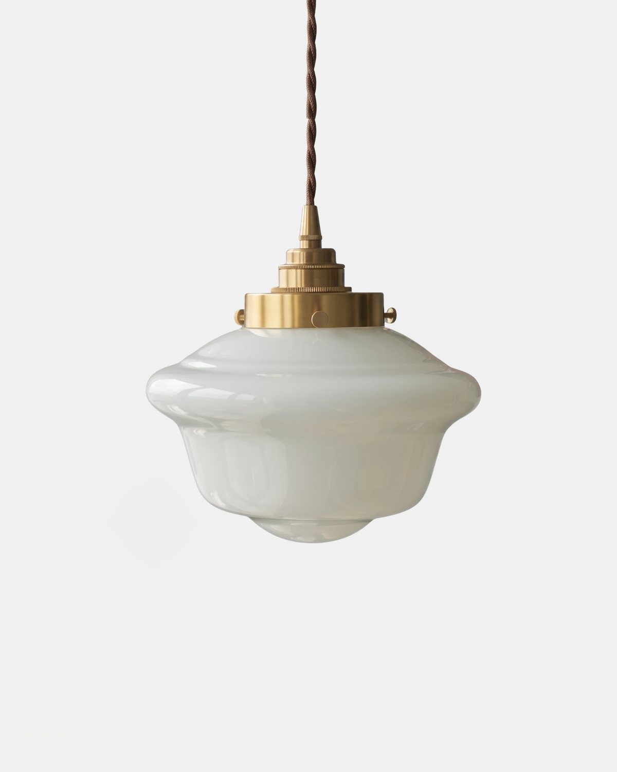 Globe pendant light SCOLA No.01 in the small size, white opaline schoolhouse glass with a brass fitter and twisted cord