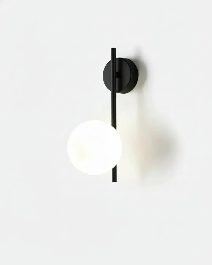 Globe wall sconce ASTRO No.01 in matte black, opal globe on a slim vertical bar with a round backplate, unlit