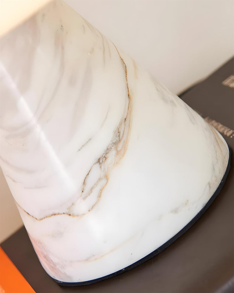 Close-up of the veined white marble base and opal dome edge of the marble table lamp OLIVA No.04