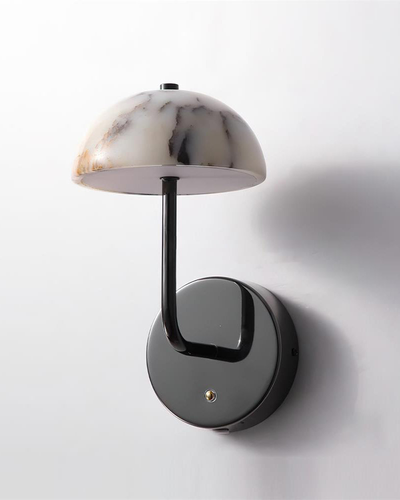 Marble wall sconce NUVOLA No.01 seen from below, white marble dome with dark veining on a gunmetal bracket