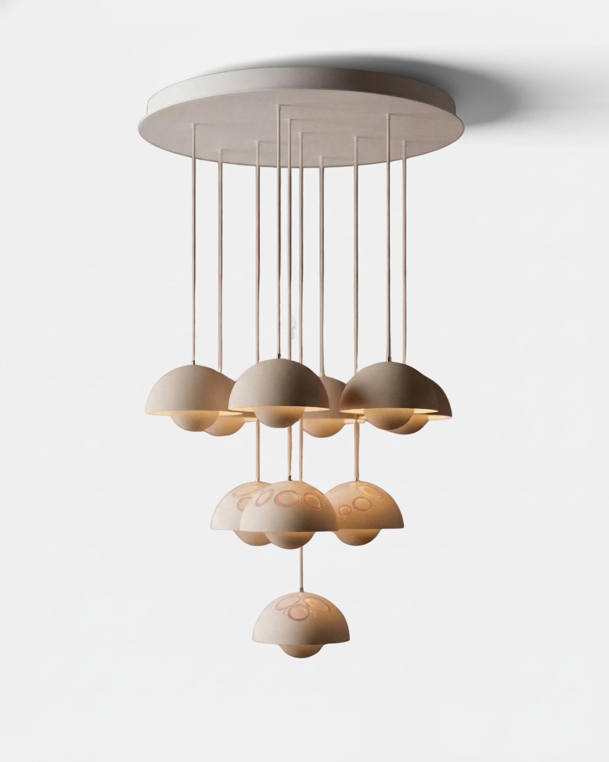 Modern chandelier FLORA No.01 Prelude, ten cream matte petal globes suspended from a round white canopy