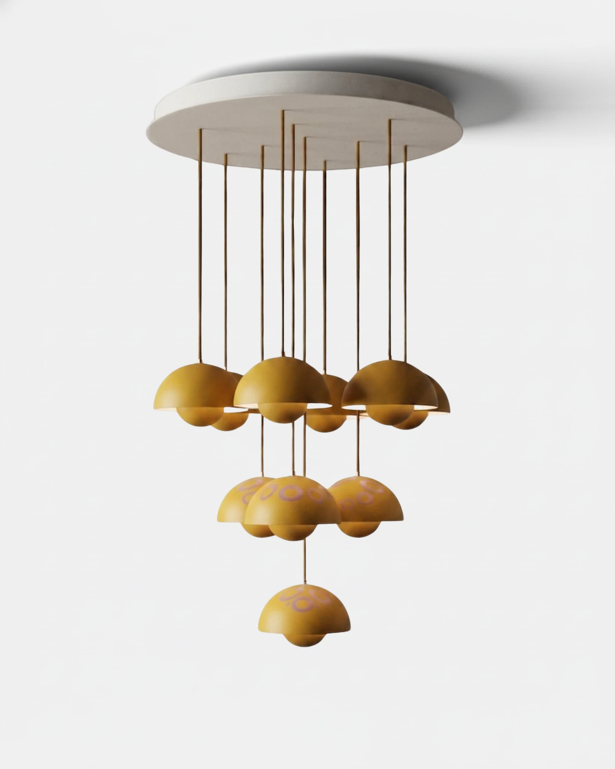 Modern chandelier FLORA No.01 Prelude with ten turmeric yellow petal globes hanging at staggered lengths