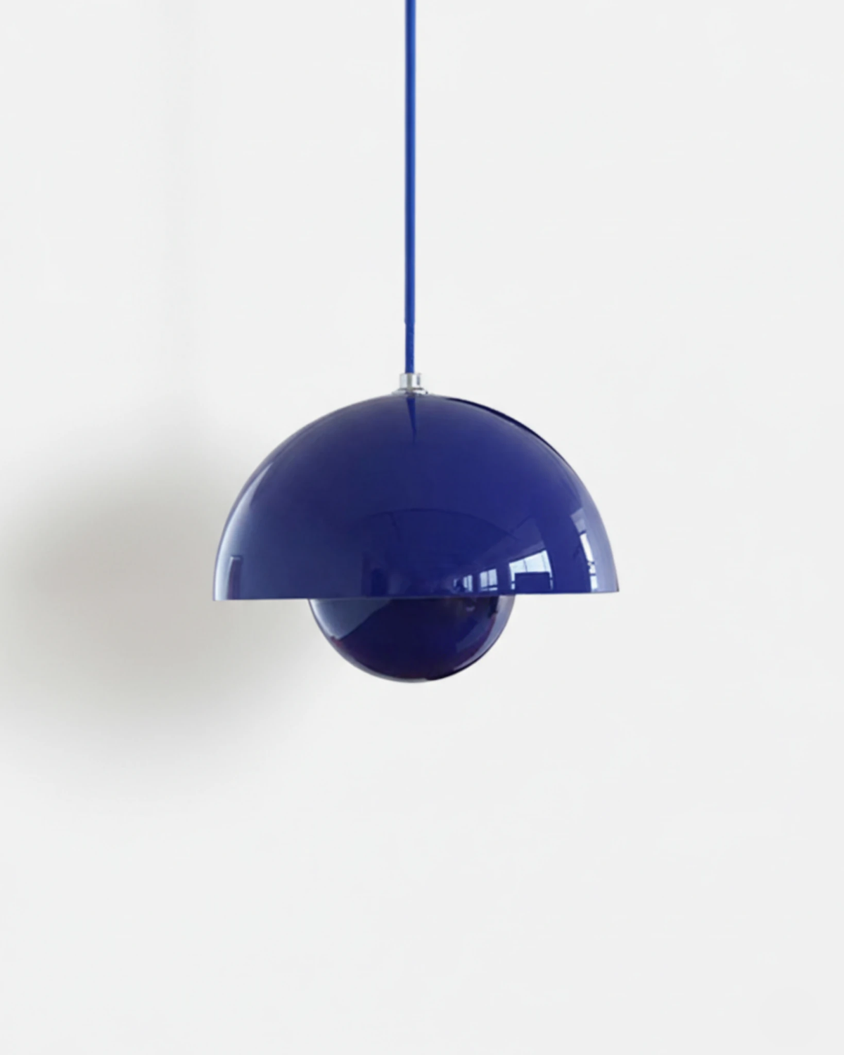 Modern pendant light ALTO No.01, medium 9 in, nested hemispheres in cobalt blue lacquer on a white background