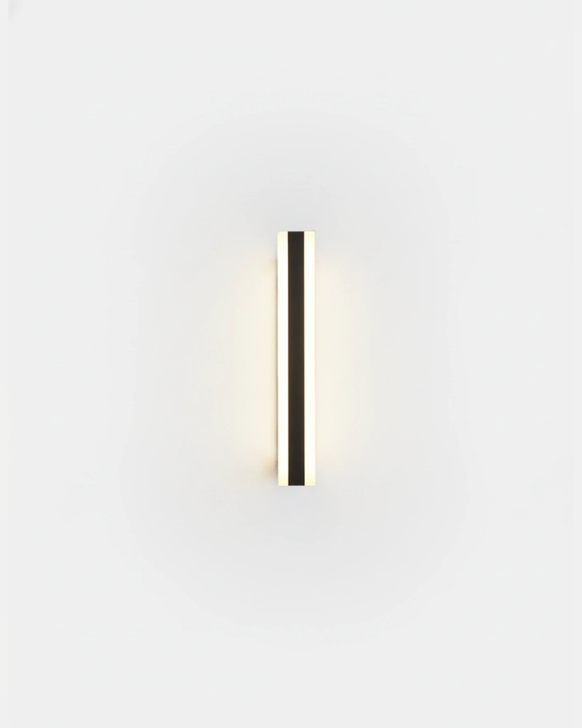 Outdoor wall sconce GIARDINO No.01 in the 40 cm height, slim black column lit with a white glow
