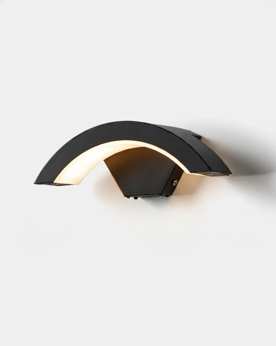 Outdoor wall sconce BALCONE No.01, black arched aluminum wall wash fixture lit on a plain background