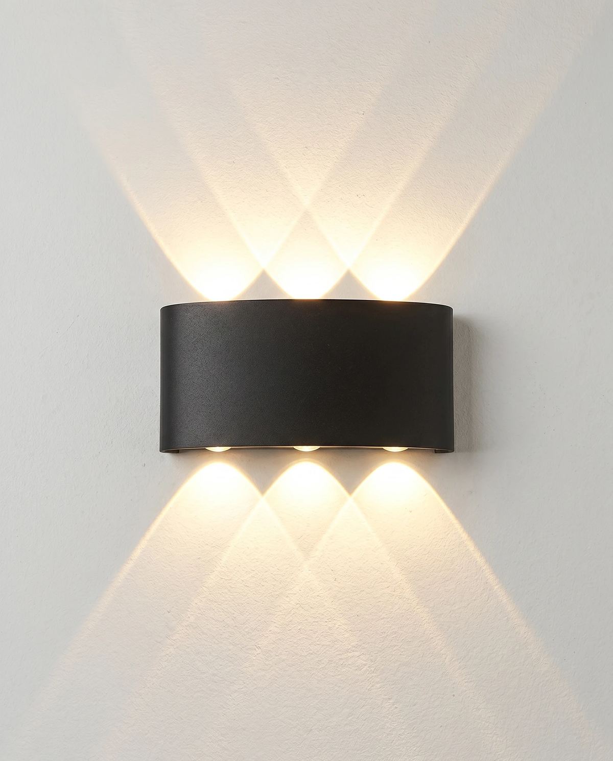 Outdoor wall sconce PALAZZO No.01 in matte black, 6W size with three beams up and three down, switched on