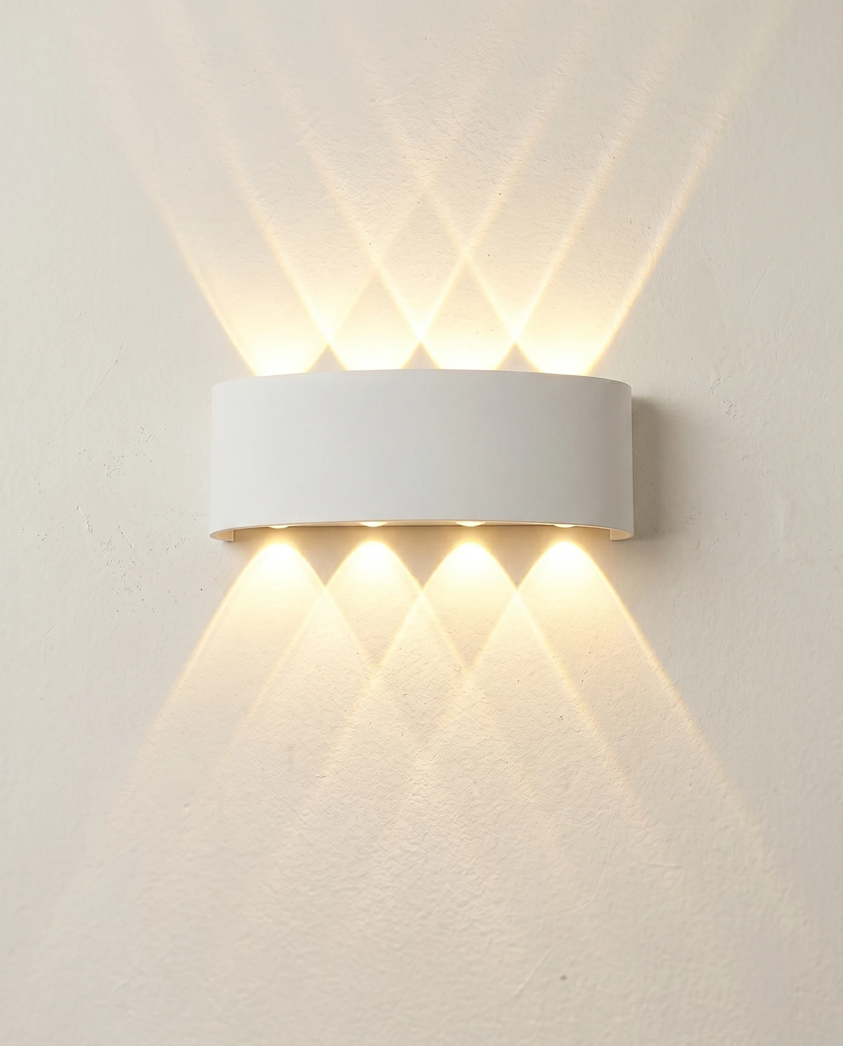 Outdoor wall sconce PALAZZO No.01 in matte white, 8W size casting four beams up and four down, lit
