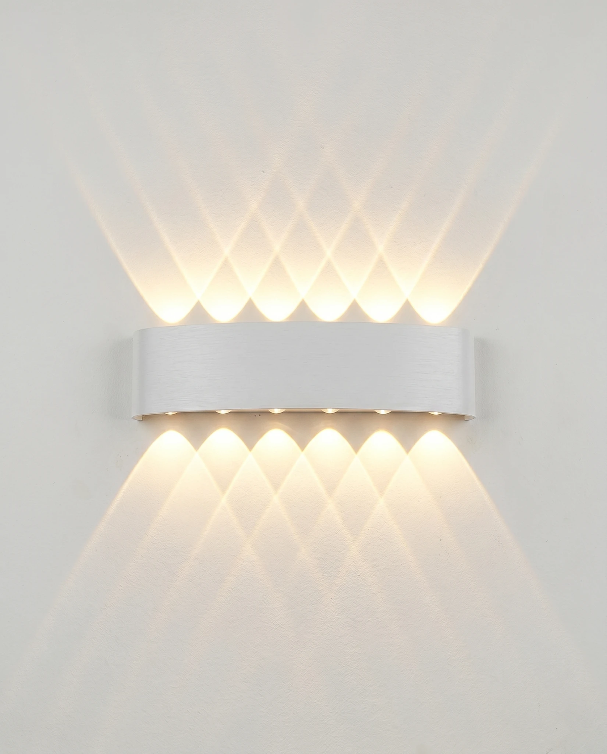 Outdoor wall sconce PALAZZO No.01 in matte white, widest bar with six beams up and six down, lit