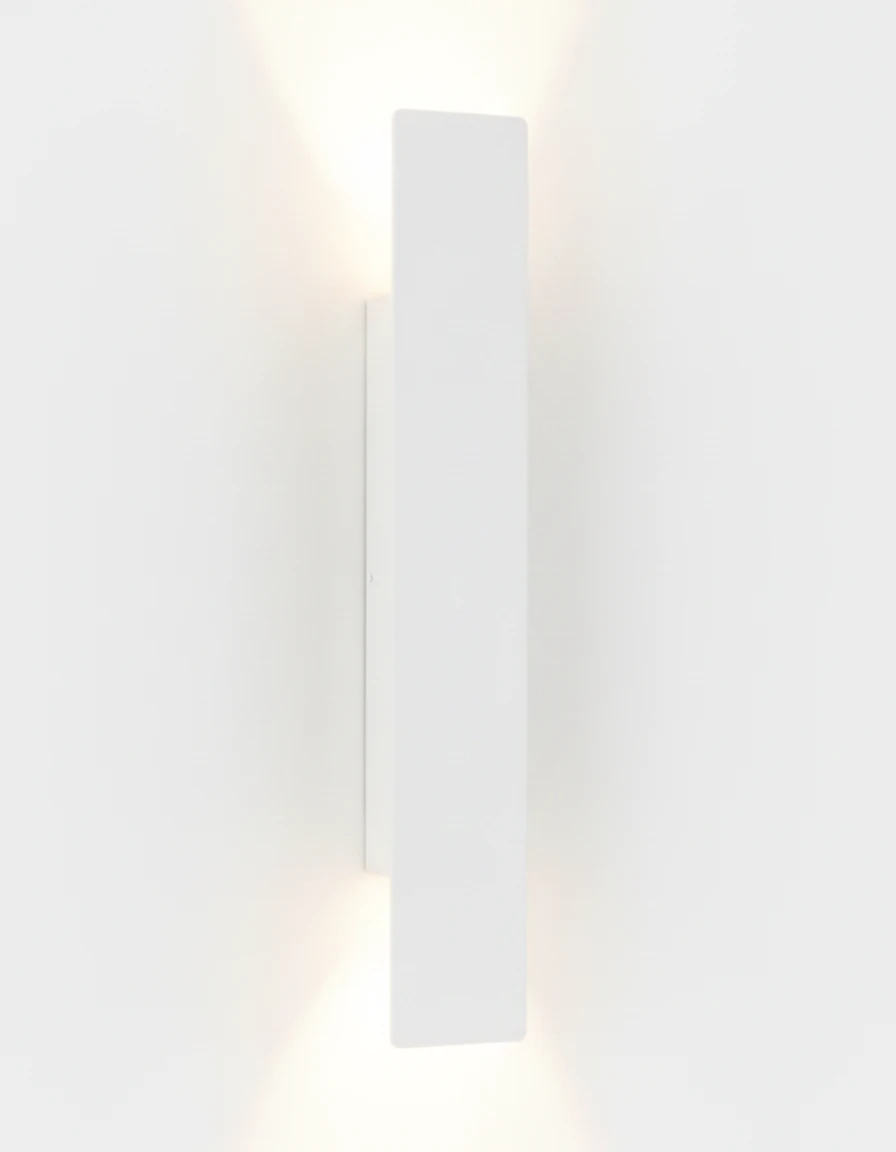 Outdoor wall sconce COLLE No.01 in matte white, XL 32 in bar glowing above and below on a white wall