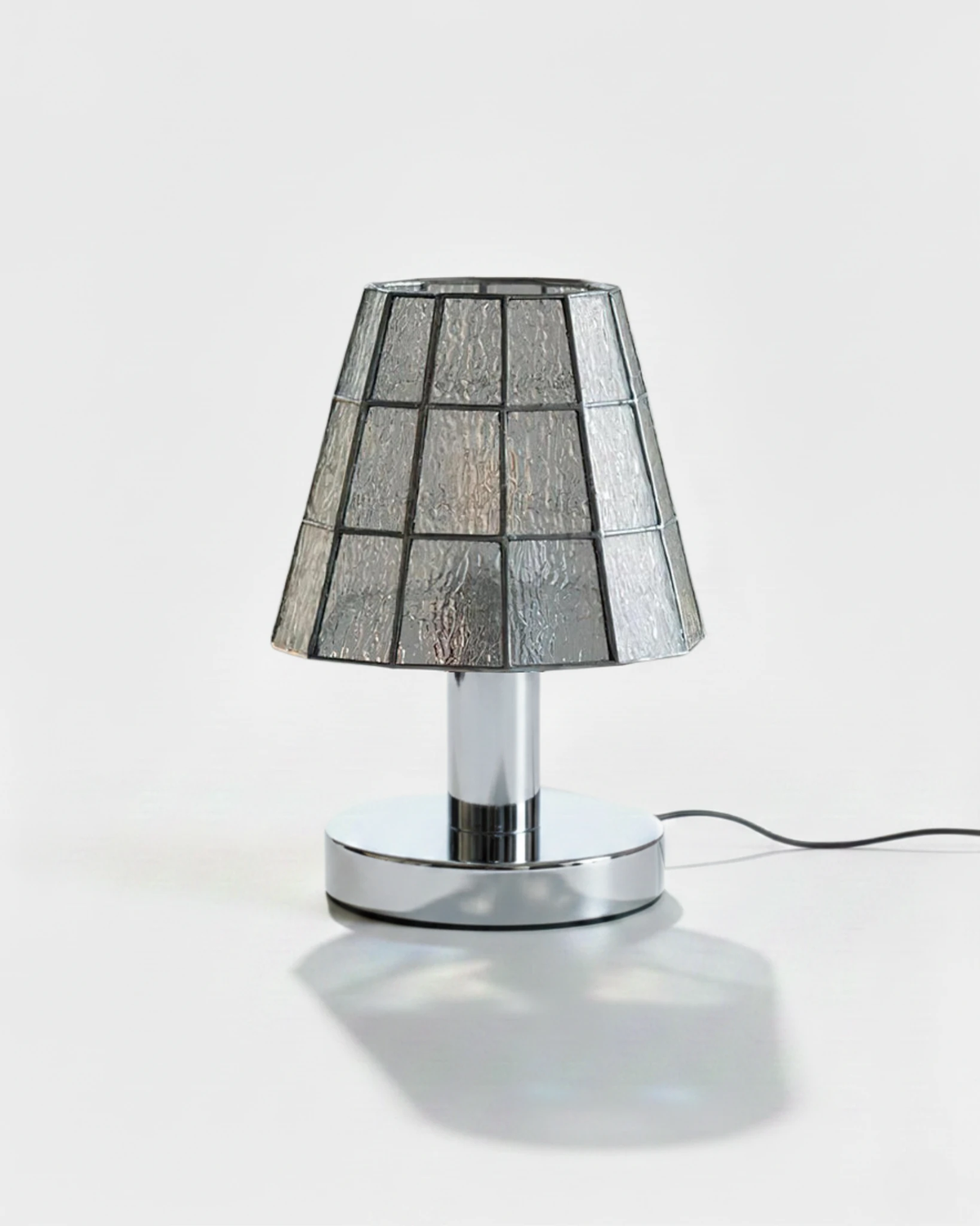 Stained glass table lamp VETRA No.01 in clear textured glass, mosaic shade on a chrome base, unlit