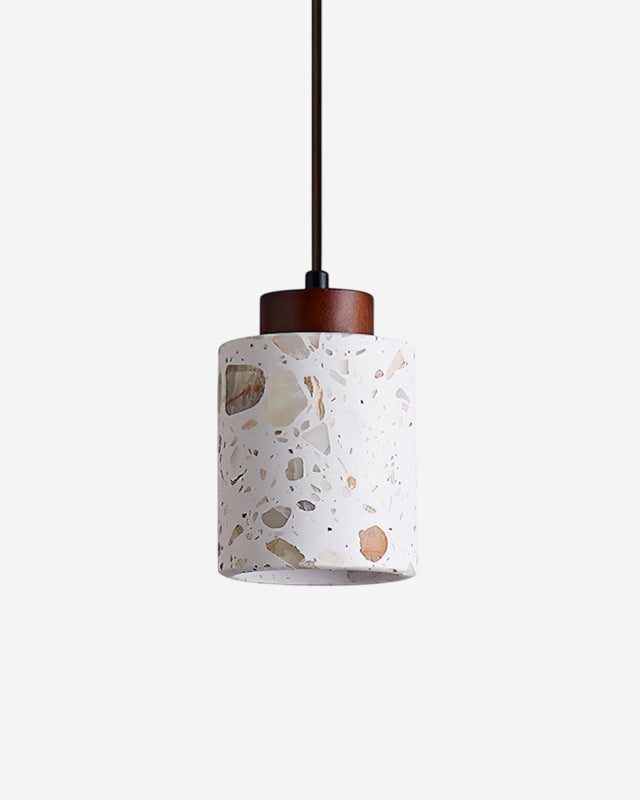 Terrazzo pendant light GROTTA No.01 cylinder with walnut cap on a black cord, unlit, white background