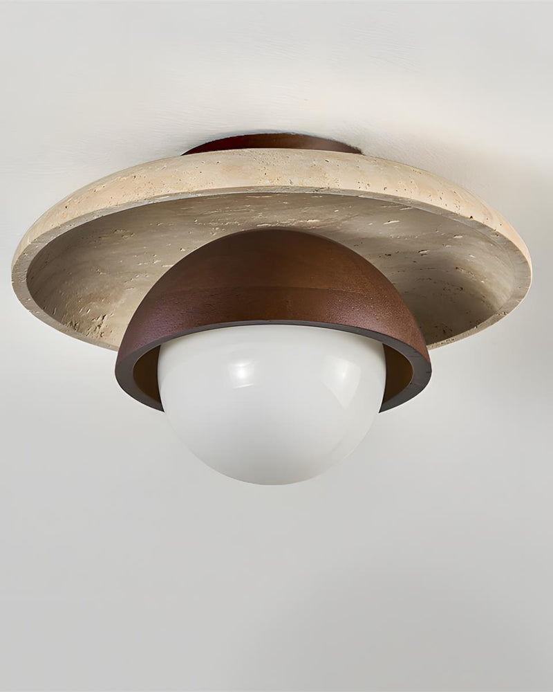 Close-up from below of the travertine flush mount ceiling light LUNA No.03, opal globe under the walnut dome