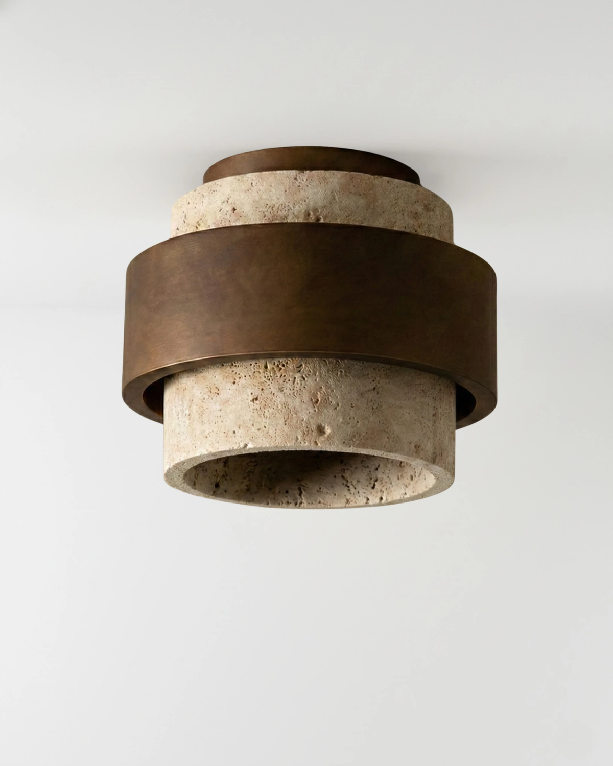 Travertine flush mount ceiling light DOMUS No.01 in Travertine, layered cream stone rings with bronze bands, unlit