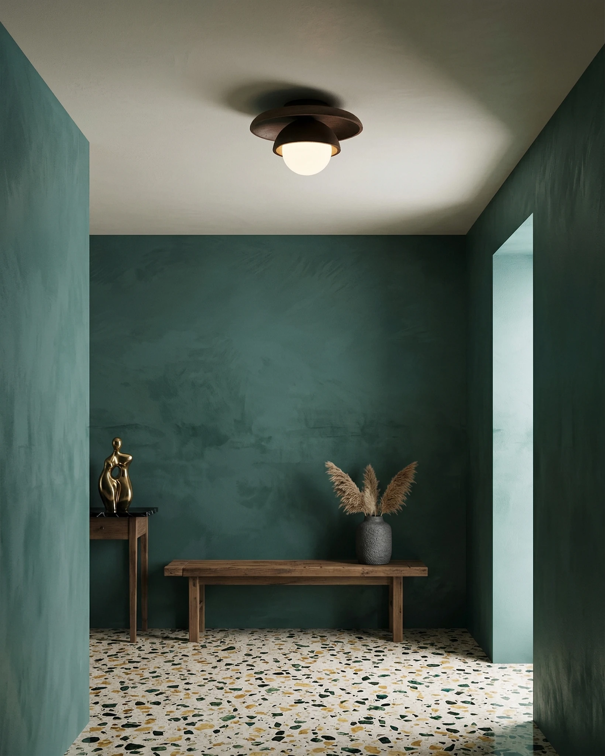 Travertine flush mount ceiling light LUNA No.03 switched on in a green plaster entry with a bench and terrazzo floor