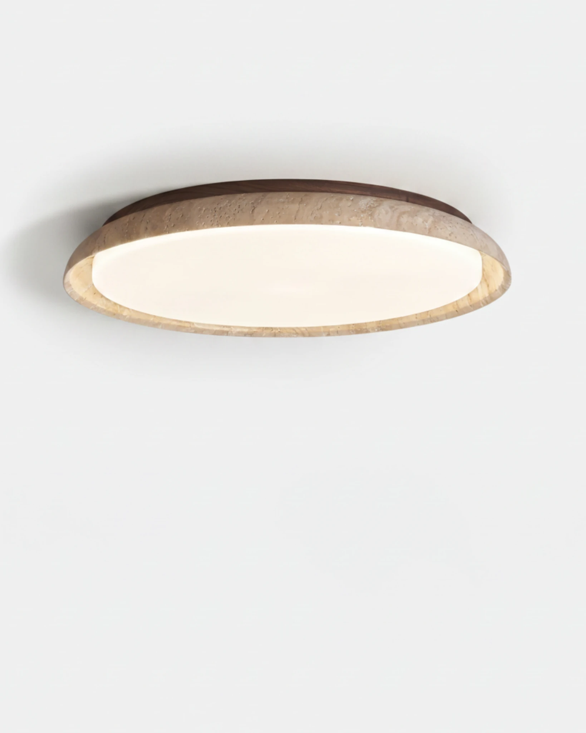Travertine flush mount ceiling light LUNA No.01 in the medium 43 cm size, cream travertine ring with warm glowing panel