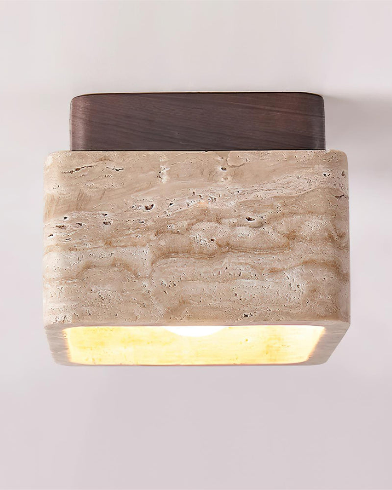 Travertine flush mount ceiling light CARSO No.01 walnut brown canopy seen from below with the block lit