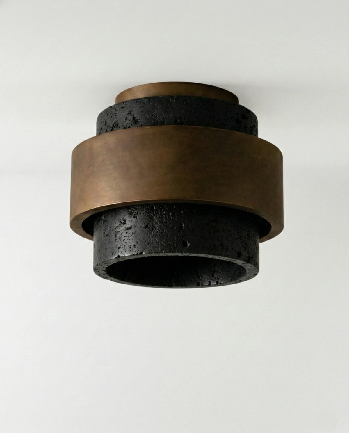 Travertine flush mount ceiling light DOMUS No.01 in Travertine black, dark pitted stone tiers with bronze bands