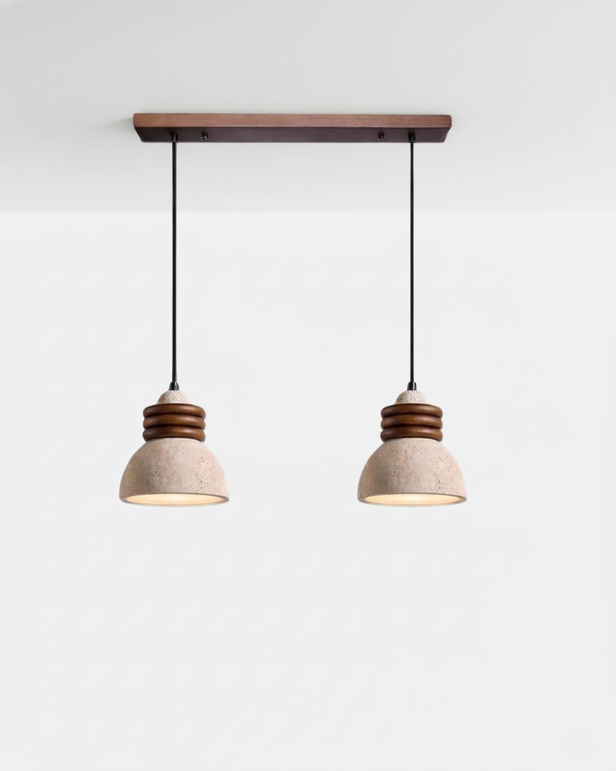 Double linear travertine pendant light DOMUS No.03, two domes on a walnut bar canopy, unlit on white