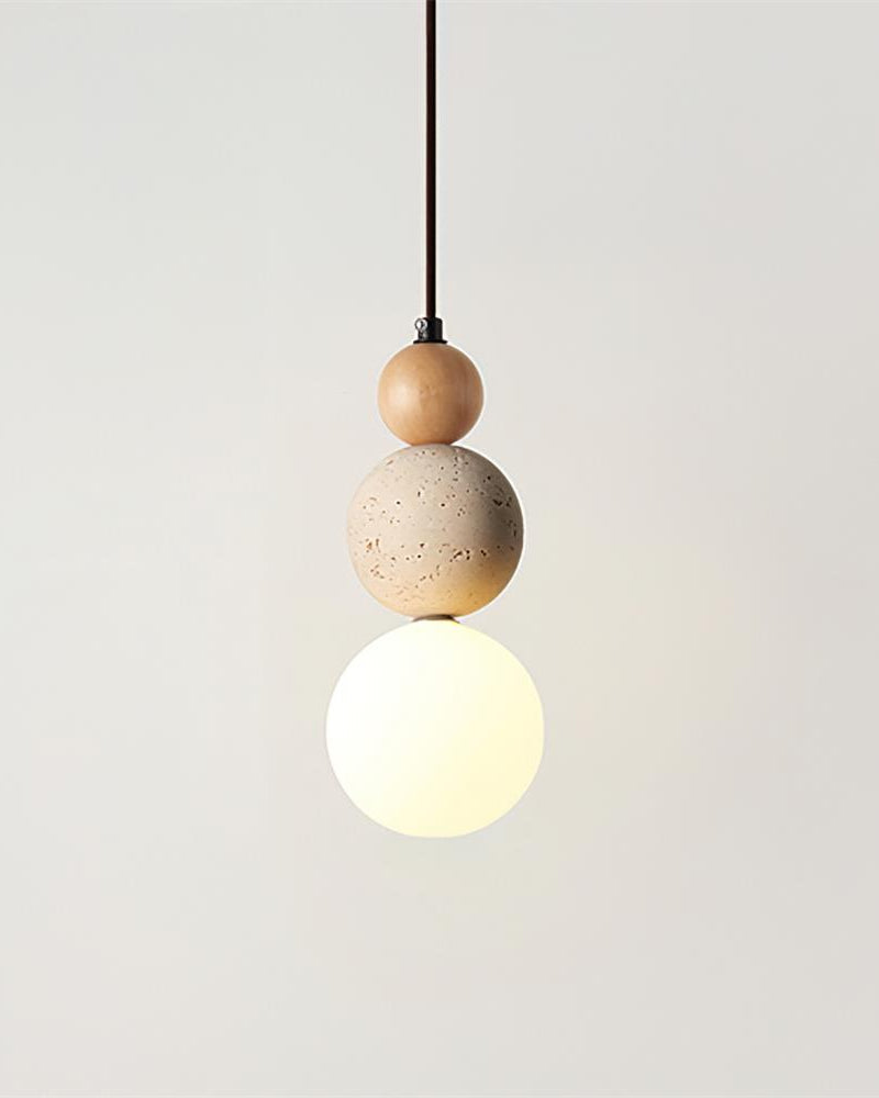 Travertine pendant light DOMUS No.04 circular silhouette in natural ash, wood and stone spheres over a lit globe
