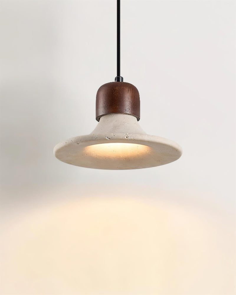 Travertine pendant light SOVA No.03 single, front view of the lit flared shade on a black cord