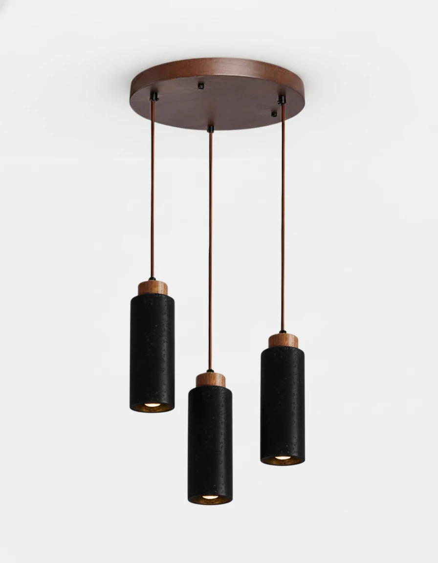 Travertine pendant light CORTO No.03 triple circular in Volcano Black, three dark cylinders from a round walnut canopy