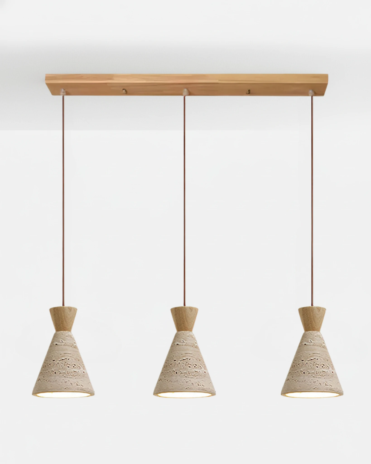 Three travertine pendant lights CONA No.02 Triple Linear in Natural Wood, light wood bar holding three cream cone shades
