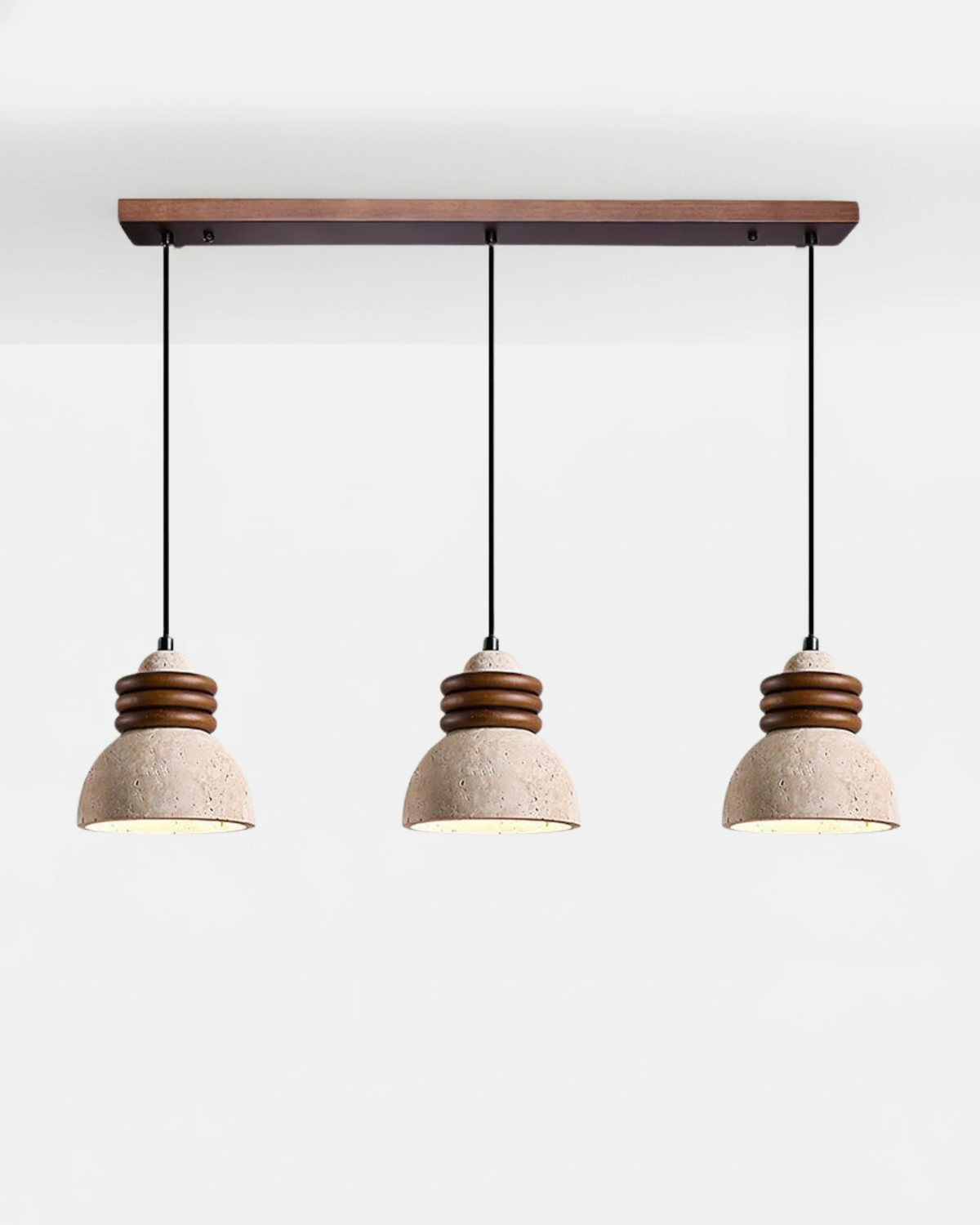 Triple linear travertine pendant light DOMUS No.03, three domes with walnut rings on a walnut bar, unlit