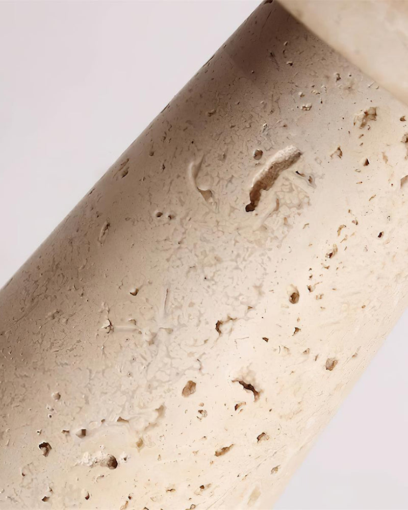 Close-up of the porous cream travertine texture on the column of the travertine table lamp MORA No.02