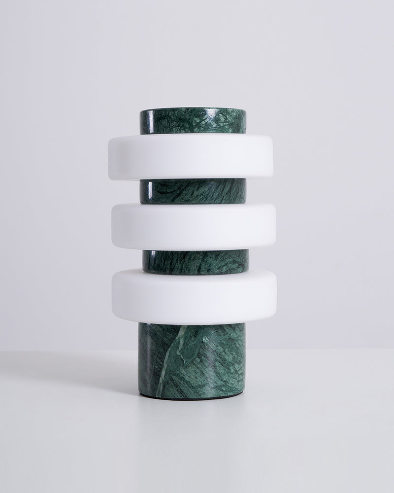 Travertine table lamp PIETRA No.05 in emerald marble, dark green stone column with white acrylic rings, unlit