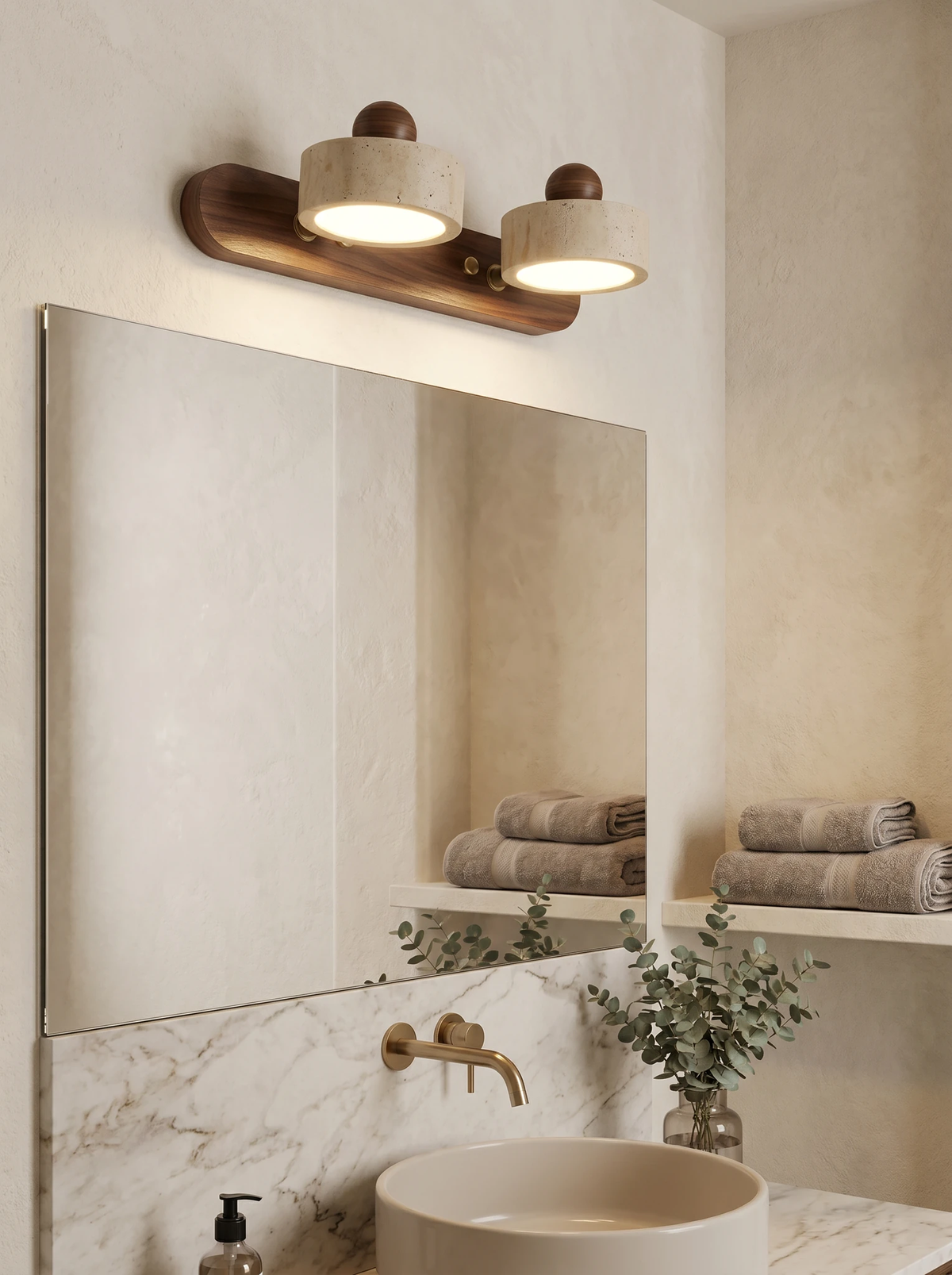 Travertine vanity light PIETRA No.02, double head on a dark walnut bar lit above a mirror over a marble sink