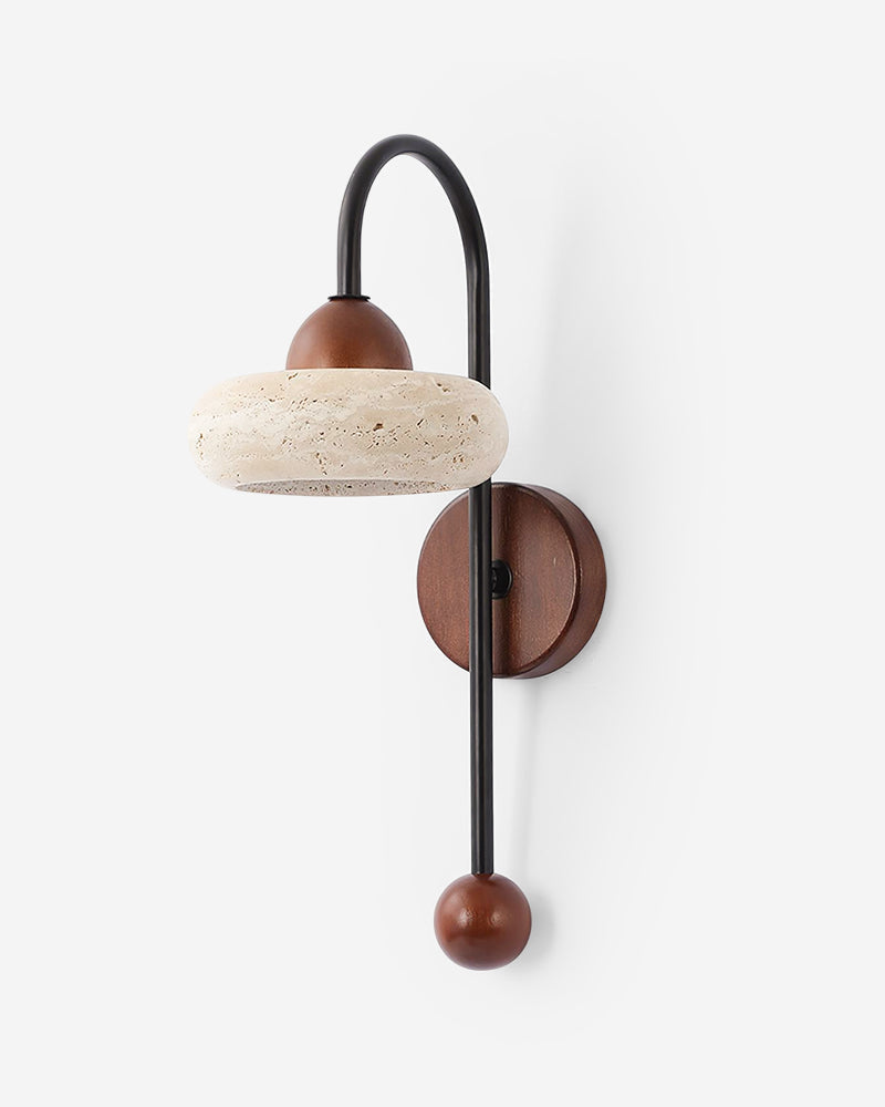 Travertine wall sconce BASSO No.01, cream travertine ring hung from an arched black arm with walnut backplate and ball